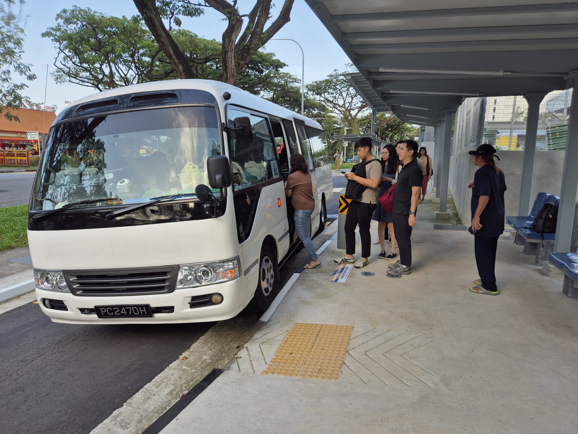 Shuttle bus pickup at depot road camp